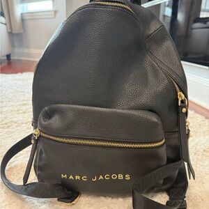 Marc Jacobs in black Leather with Gold Zipper